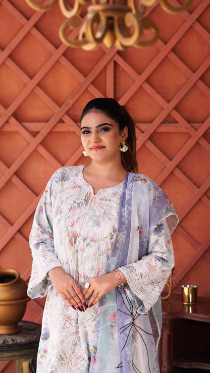Mahroze Kurta Set featuring a light blue and white floral printed kurta with wide sleeves, white trousers, and beige heels.