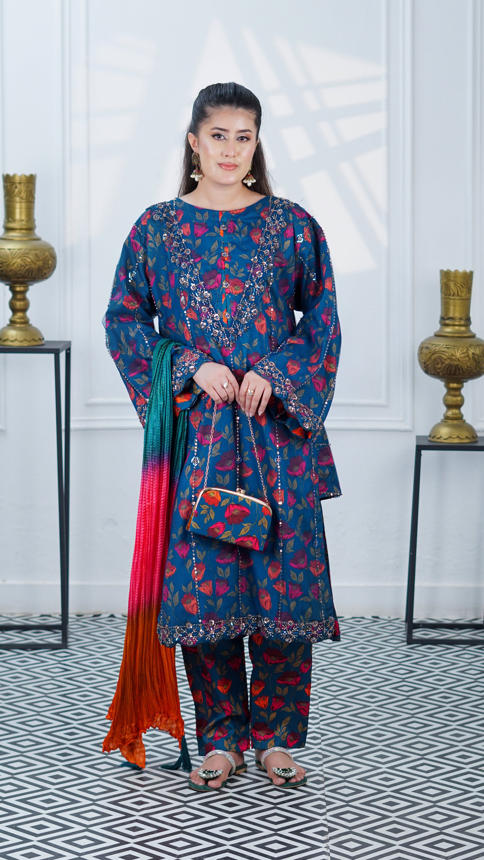 Noor-e-Daana luxury embroidered crepe ensemble with multi-silk dupatta and handmade clutch