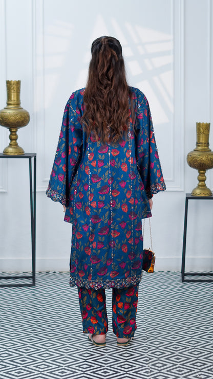 Noor-e-Daana complete luxury ensemble with embroidered kurta, trousers, dupatta and handmade clutch